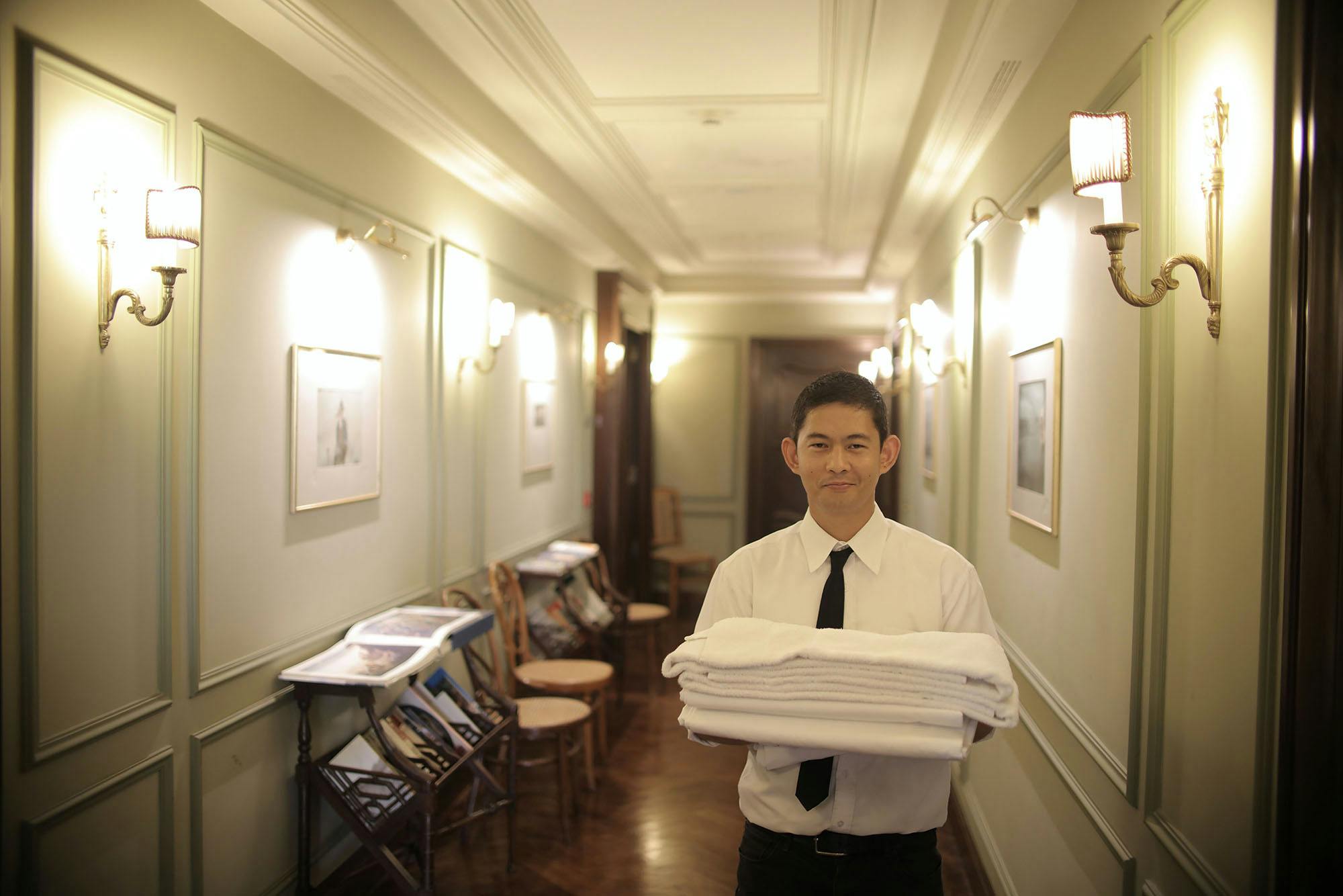 A member working in a hotel environment